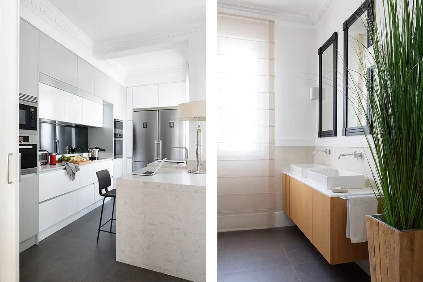 Vista de baño y cocina de una vivienda con paredes blancas y suelo oscuro.